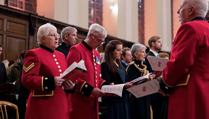Chelsea Pensioners singing in the Wren Chapel during a service